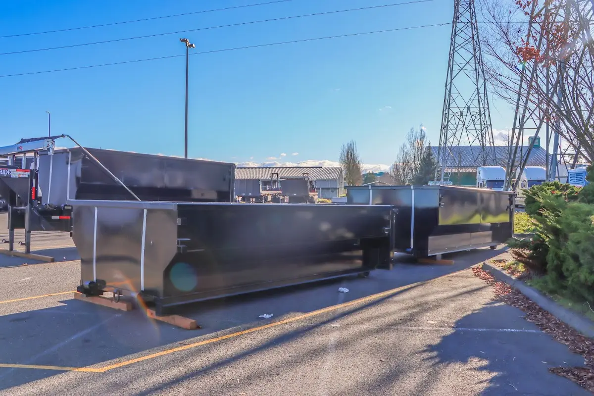 Roll-off dumpster ready for waste disposal at job site for Yard Waste Dumpster Rental in Palm Coast